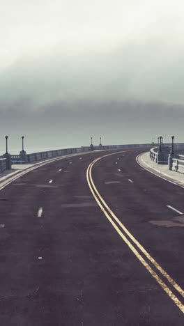 empty road leading through fog