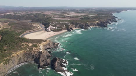 flying over cliffs and beach in portugal