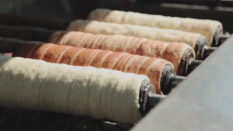 In-and-out-of-focus-moment-from-some-rotating-and-baking-hungarian-chimney-cakes