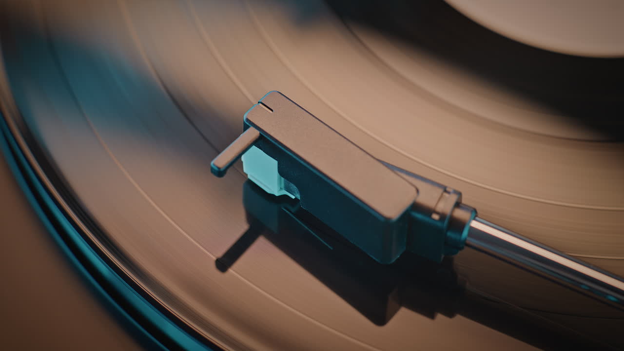 Close-up of a record player stylus on a vinyl record