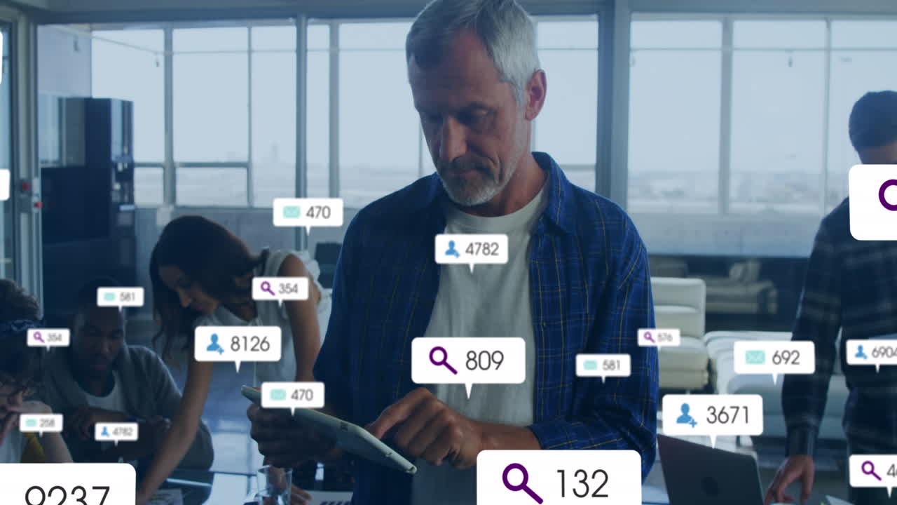 Animation of changing numbers, icon in notification bars, caucasian man using digital tablet