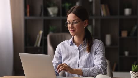 happy young caucasian businesswoman resting, finishing computer work.