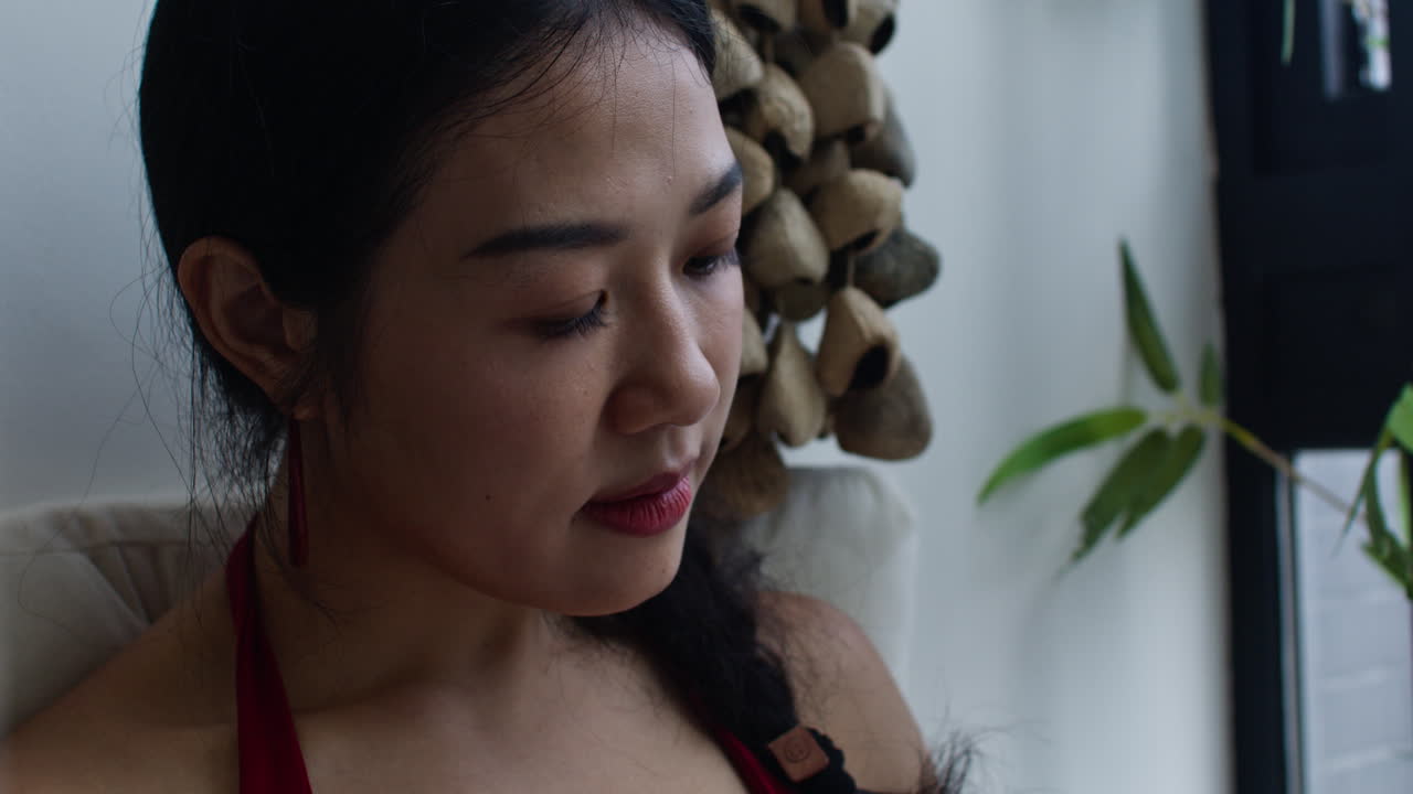 Woman Reading a Book Indoors