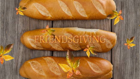 animation of friendsgiving text over fall leaves and bread