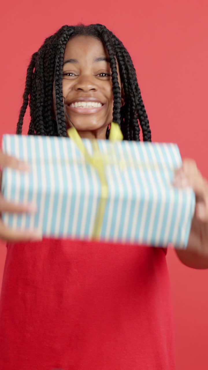 Portrait of Smiling Woman with Gift