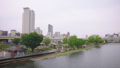 osaka nakanoshima park and urban city background in early summer of japan