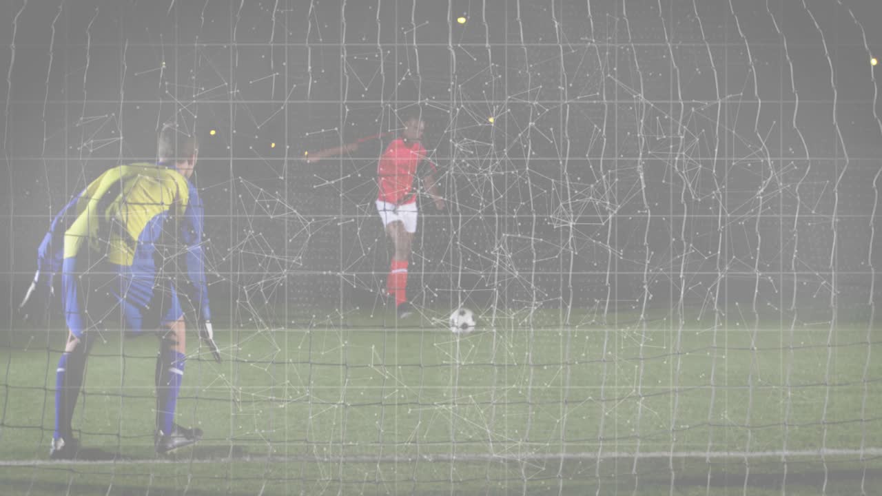 Sports penalty taker taking steps, kicking ball into net for scoring goal as goalkeeper diving