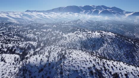 on a sunny day in snowy high mountains, an amazing sight unfolds