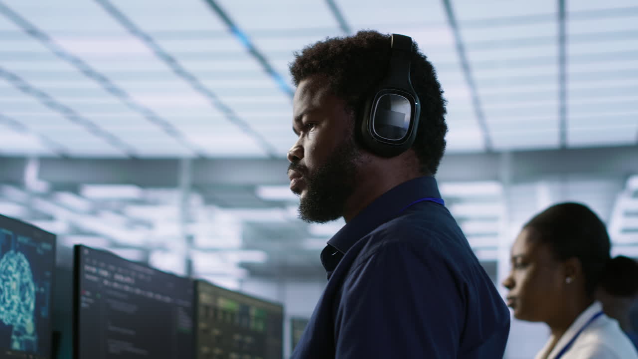 Team of Workers in Modern Control Room