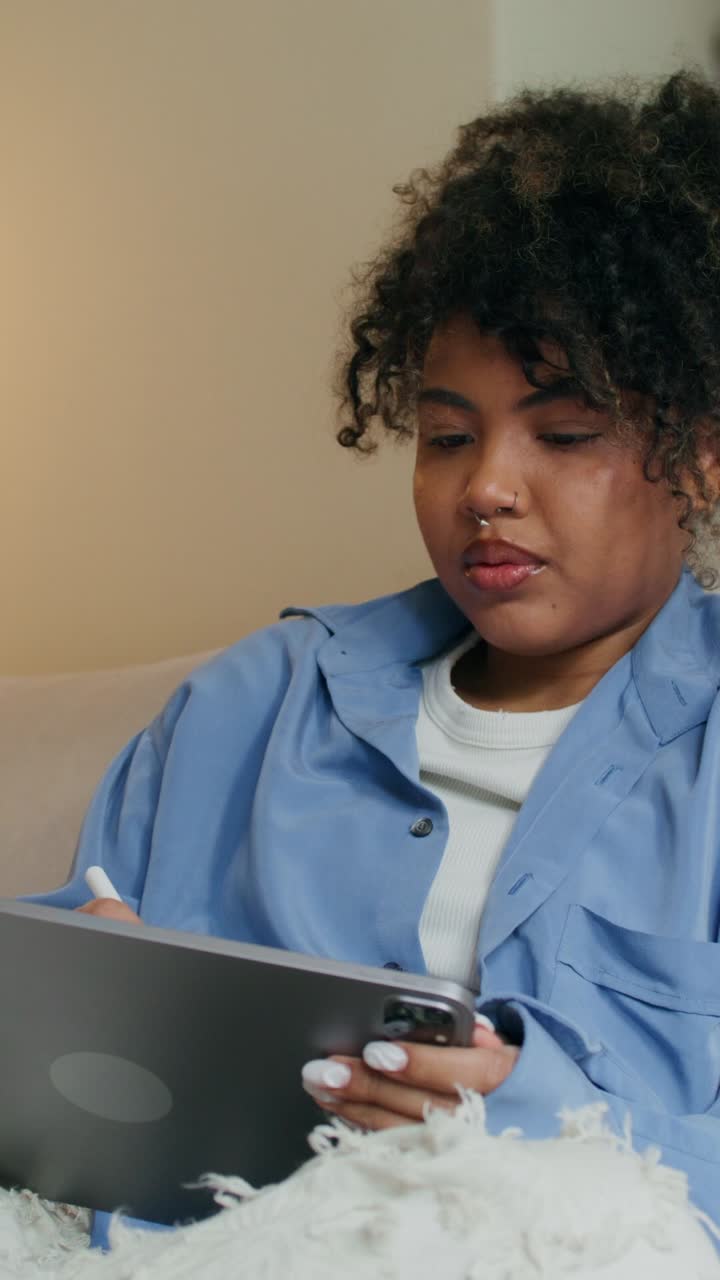 Woman using digital tablet and smartphone