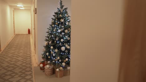 cover the christmas tree with lights that sparkle in the night. christmas tree with decorations and illumination