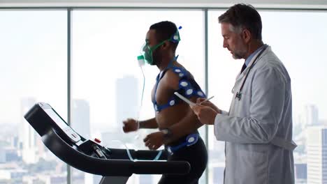 athlete undergoing medical fitness test with doctor