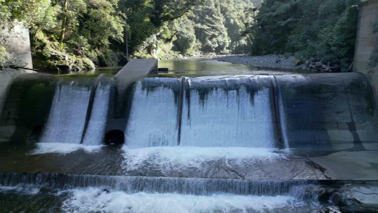 A drone shot over a river weir