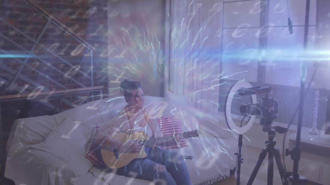 바이너리 코딩의 애니메이션과 여성 vlogger 녹화 vlog 위에 반 ⁇ 이는 빛