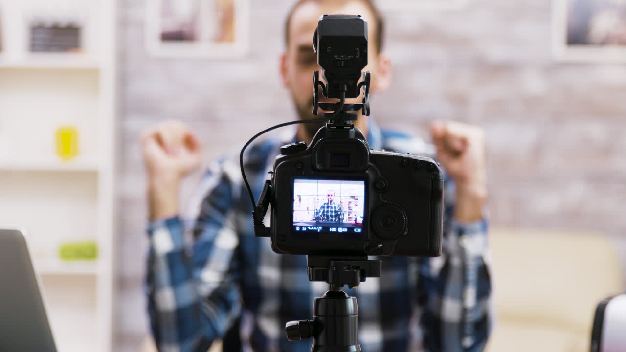 Man Vlogging with Professional Camera
