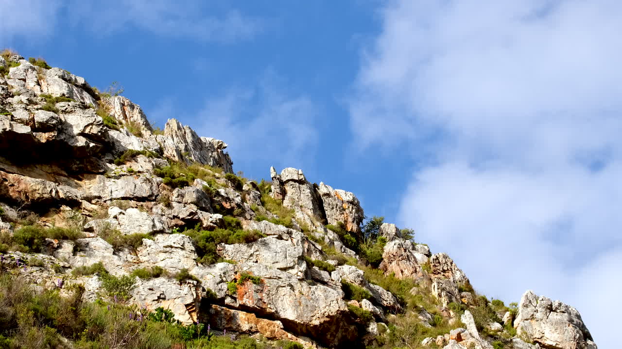 Rocky Mountain Landscape with Blue Sky and Clouds