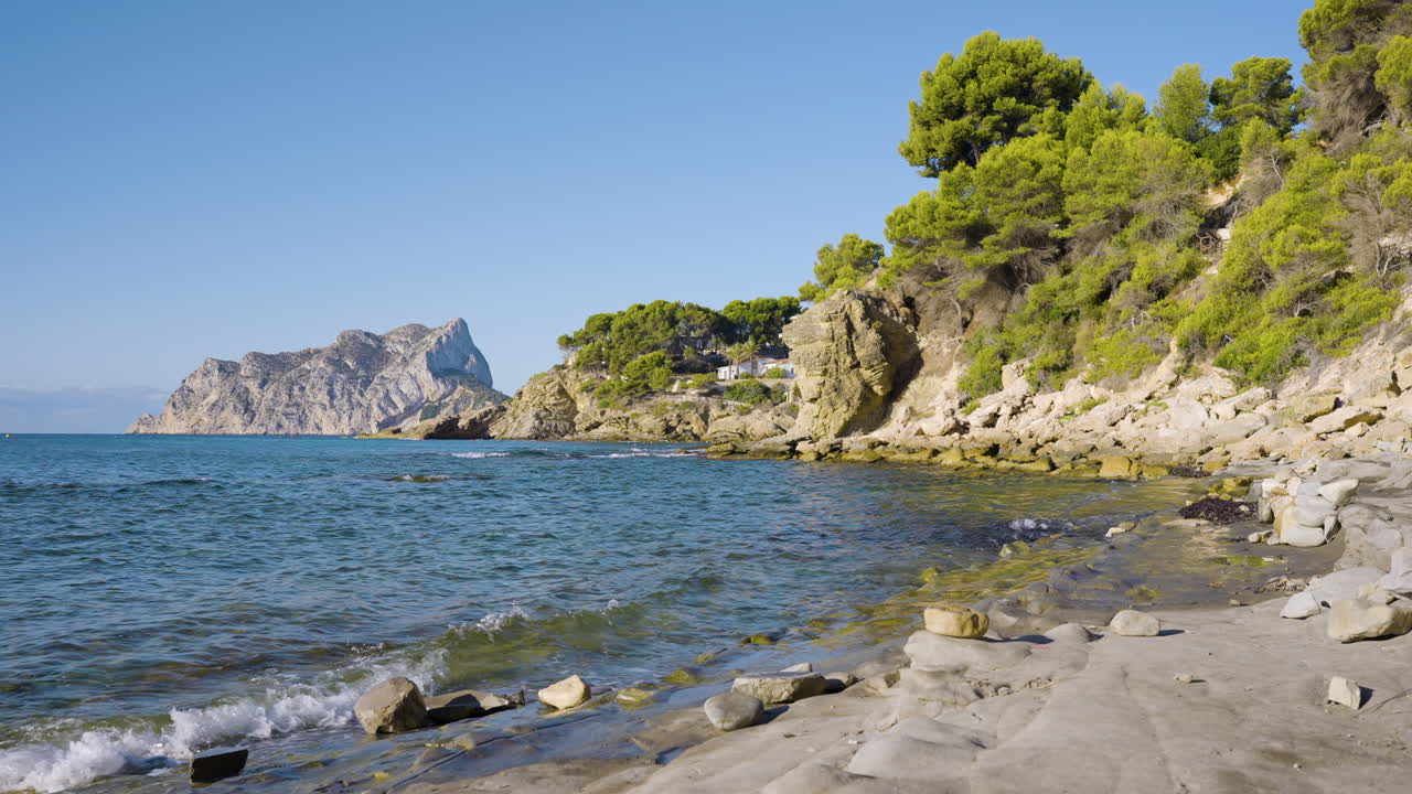 Coastal scenery with mountains and trees
