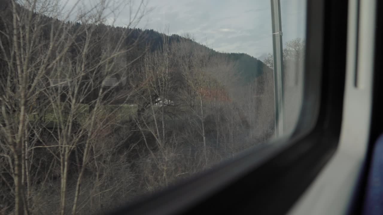 view from outside the train window in winter around Creux Du Van, Neuchatel, Switzerland. travel videos in winter.