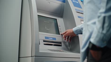 person using an atm