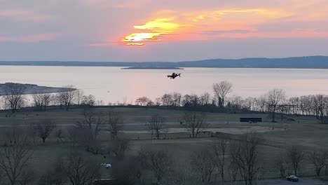 An-aerial-view-over-Calvert-Vaux-Park-in-Brooklyn,-NY-during-a-cloudy-evening