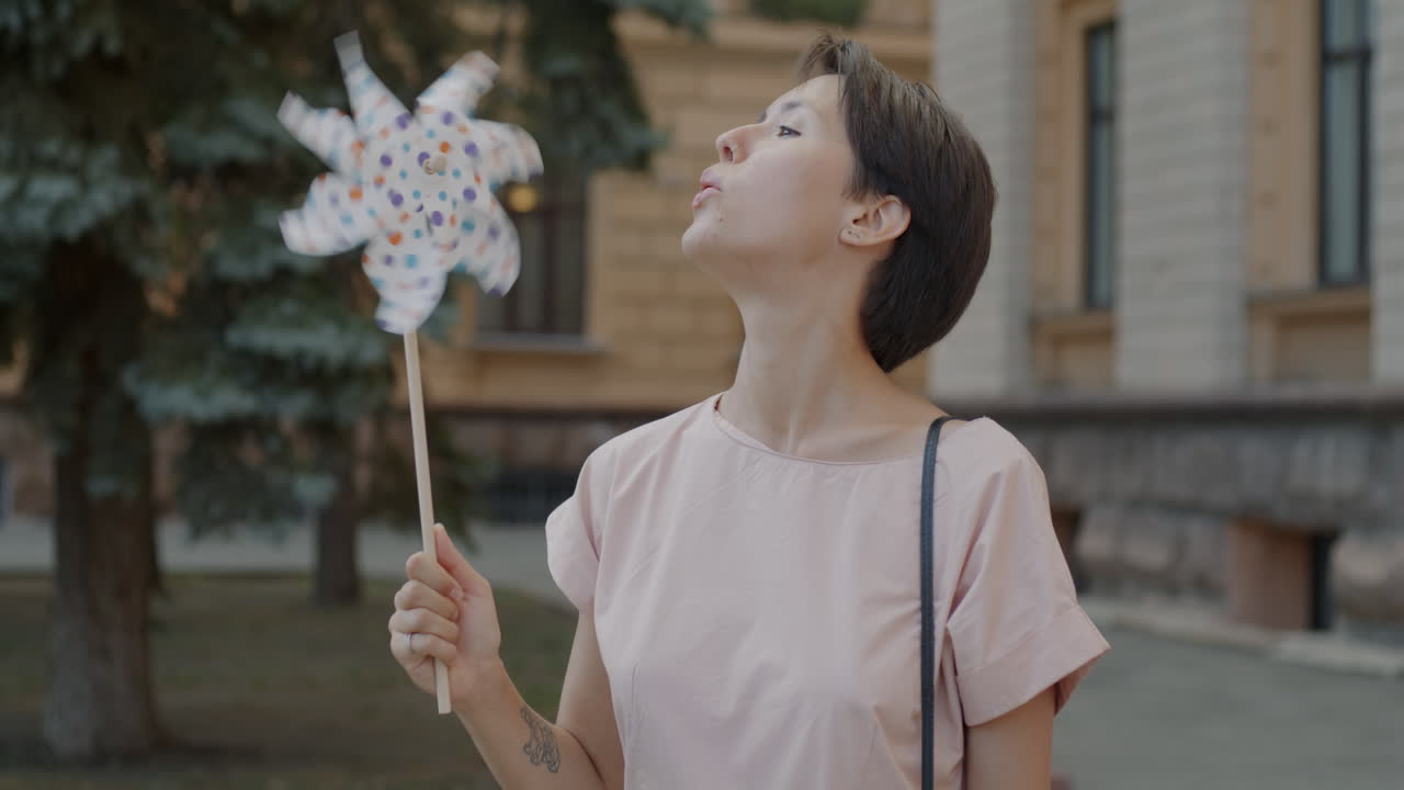 Woman with a pinwheel