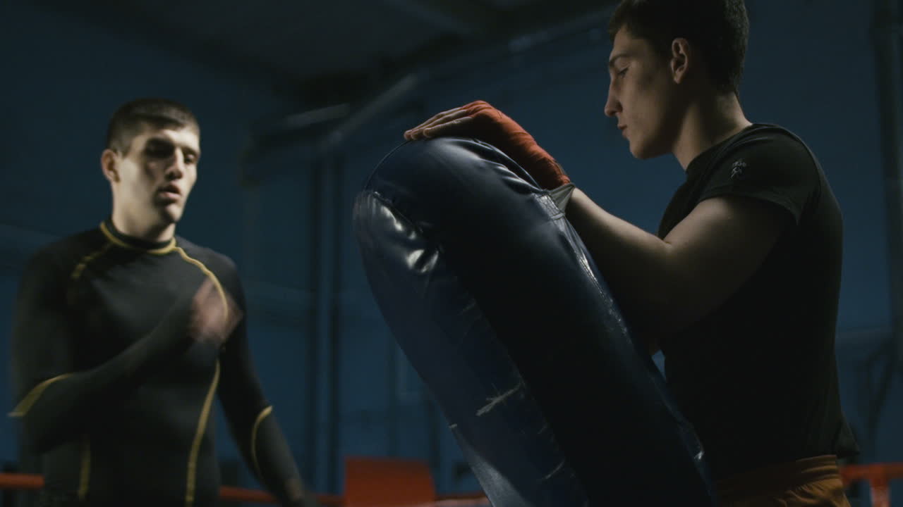 MMA Training Session with a Kick Pad