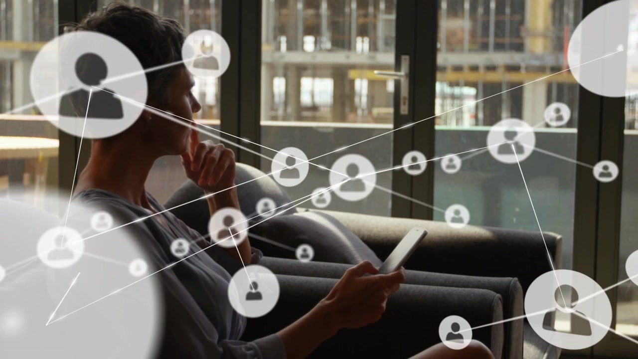 Mature woman scrolling phone by windows, activating icon network linking contacts for technology