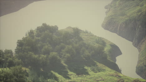 scenic countryside landscape with green summer mountain valley and forests