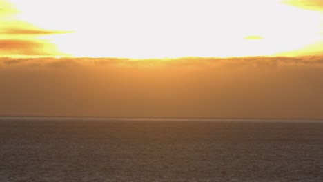 shooting a majestic sunset or sunrise landscape on the sea on the horizon