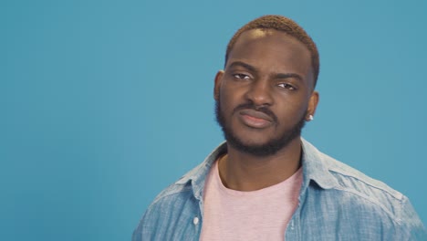 Portrait-of-thoughtful-and-confused-pensive-black-young-man.