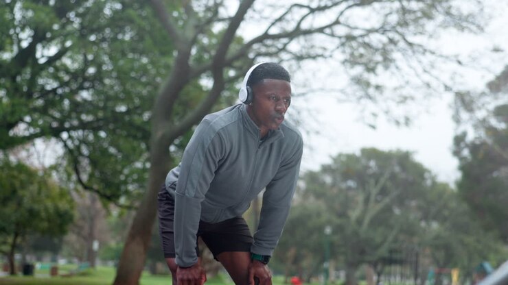 Man resting after a workout in a park