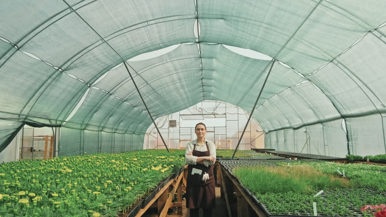 Portrait of Female agronomist in Greenhouse