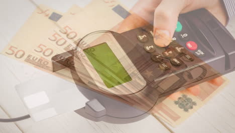 animación de billetes en euros que caen sobre la mano de un hombre caucásico que tiene una terminal de pago