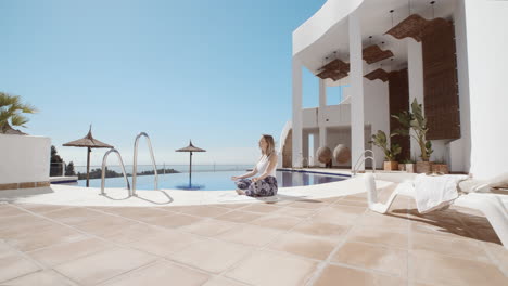 bohemian woman in profile angle meditating in a relaxing environment