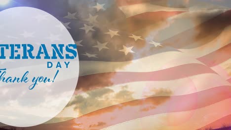 Composition-of-veterans-day-thank-you-text,-over-american-flag-and-sunset-sky