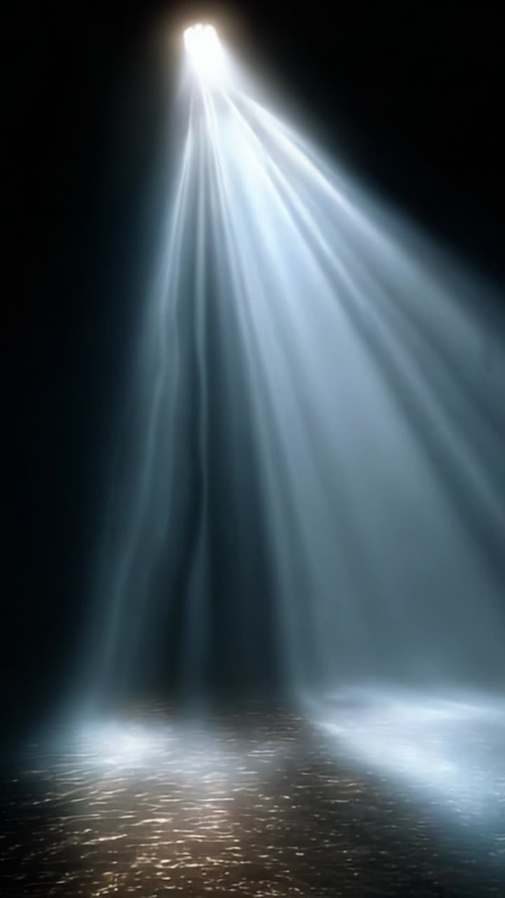 Dramatic Light Rays Illuminating a Calm Water Surface with Radiant Reflections in a Dark Environment Creating an Ethereal Atmosphere and Visual Impact