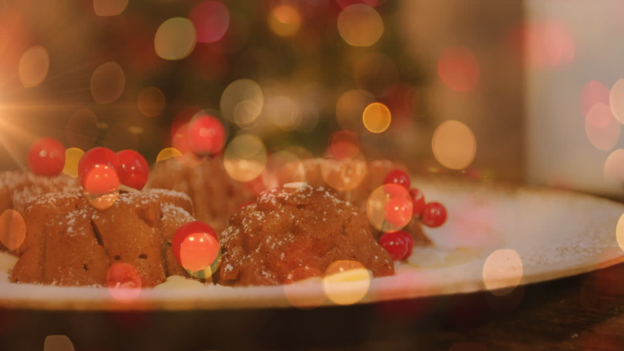 animación de un plato con pudín de navidad y luces brillantes