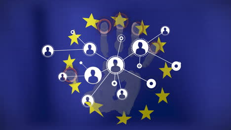 network of connections animation over european union flag with handprint