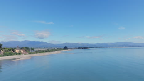 drone circling the coastline of the tasman district, new zealand