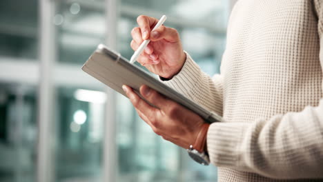 man using a tablet with a stylus