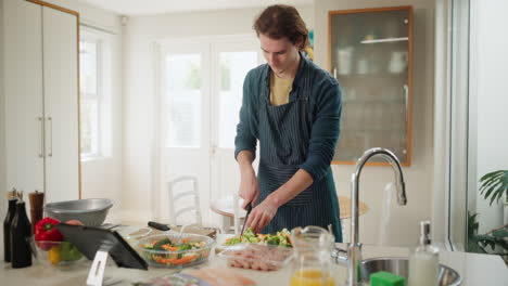 man preparing food in the kitchen
