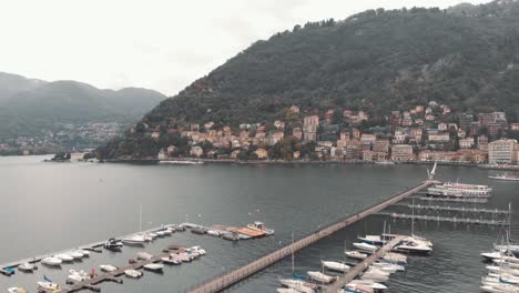 yachts and motorboats at upscale como lake marina