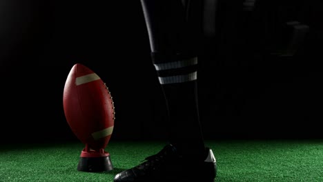 american football player kicking the ball 4k