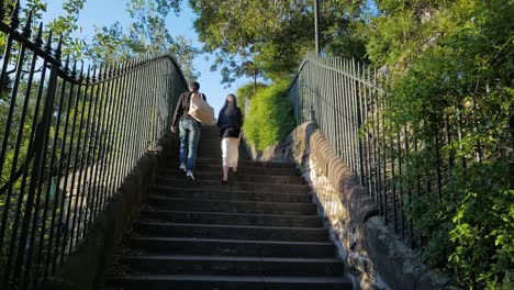 couple walk up steps