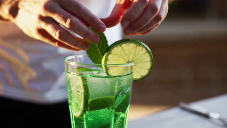 bartender preparing a mojito