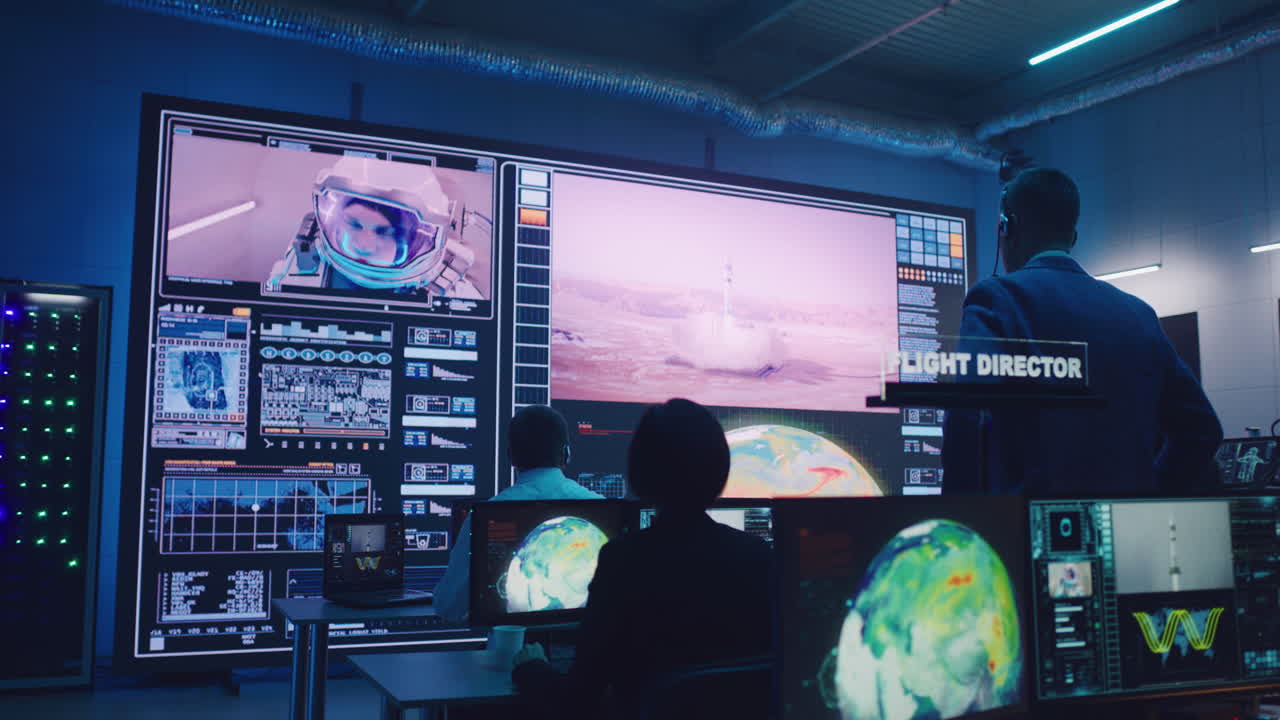 Mission Control Team Monitors Rocket Launch