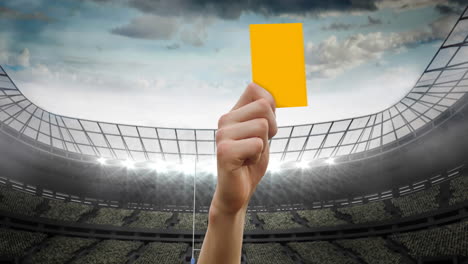 animación de un árbitro sosteniendo una tarjeta de penalización amarilla sobre un estadio deportivo