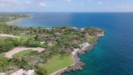 Calm-Blue-Seascape-During-Summer-In-Punta-Aguila-With-Golf-Course-In-Casa-de-Campo,-Dominican-Republic