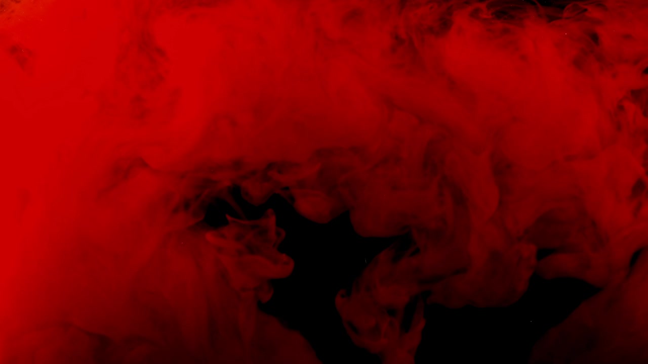 Forme astratte. Riprese su sfondo nero. Mescolanza di colori