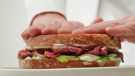 chef preparing a delicious reuben sandwich